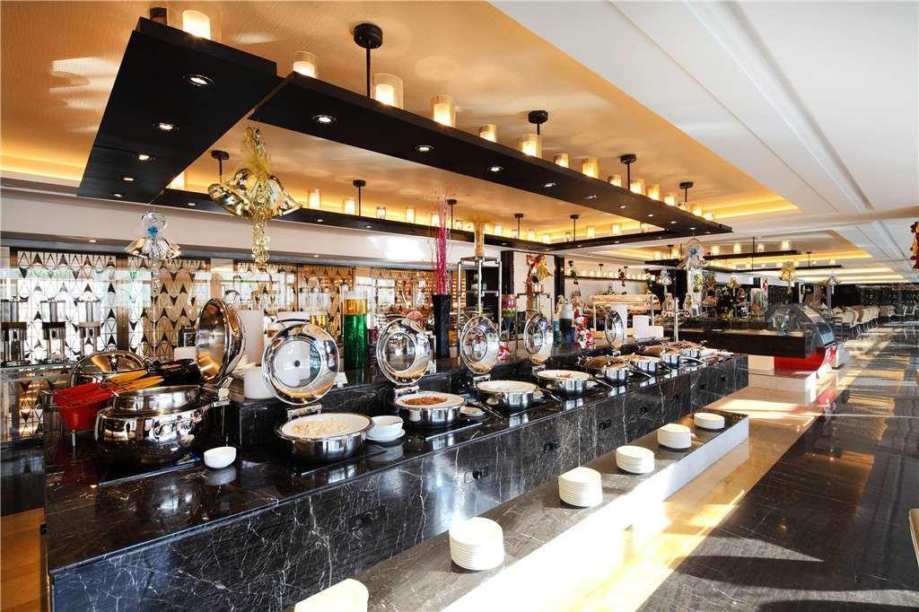 هافي Days Hotel Wenyi Anhui المطعم الصورة